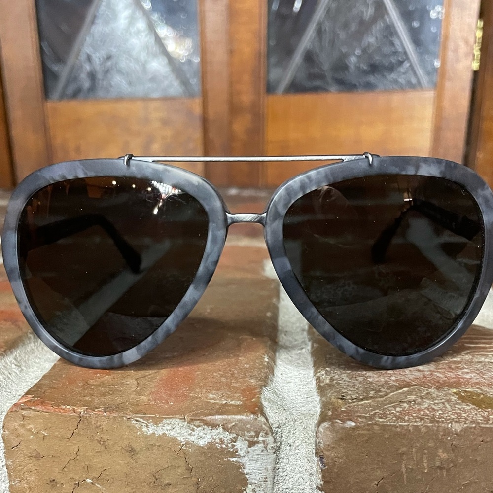 Dolce and Gabbana unisex sunglasses.